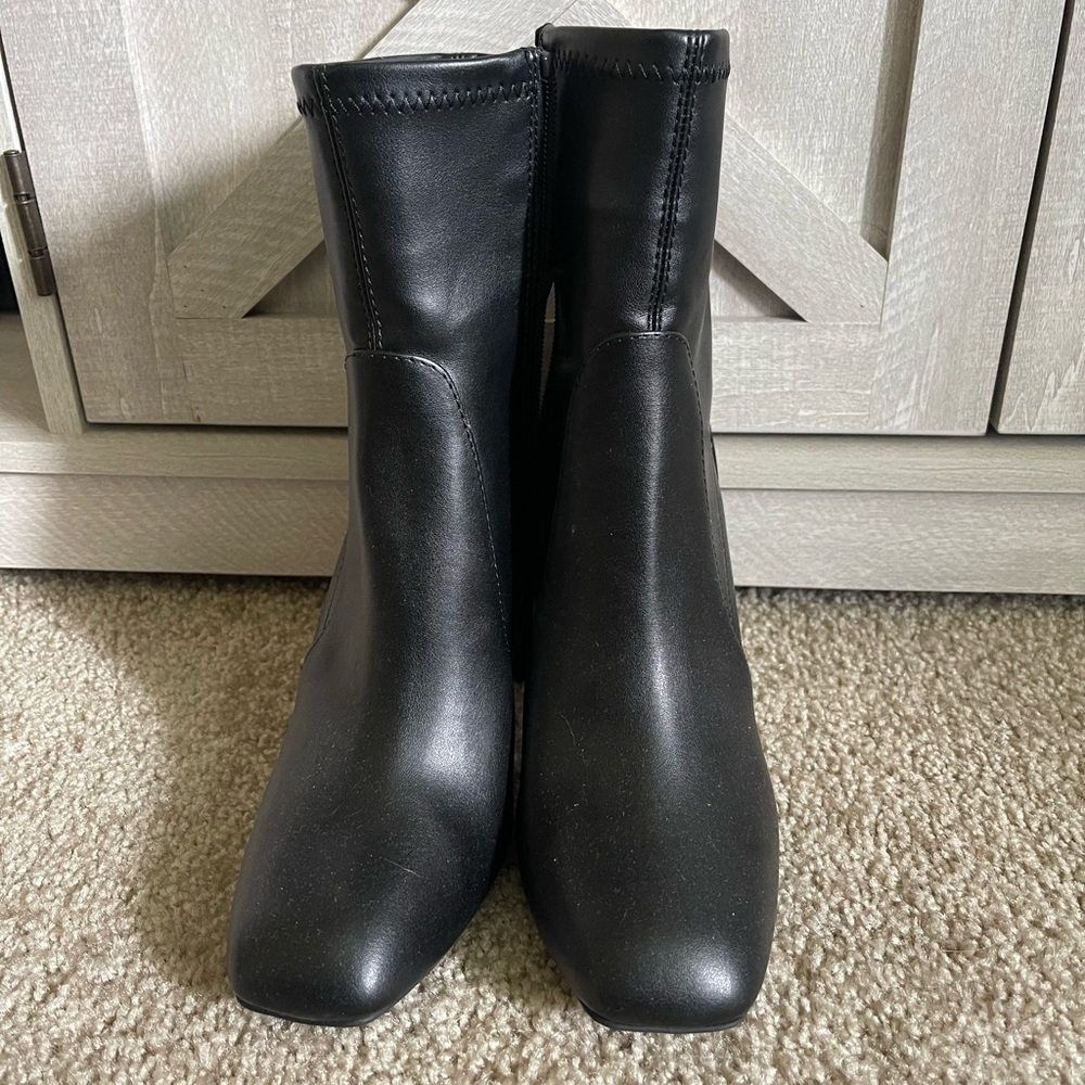 A new day black booties. Never worn